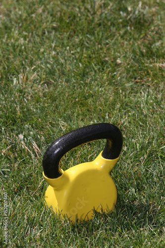 Fototapeta Naklejka Na Ścianę i Meble -  dumbbells on grass.outdoor training