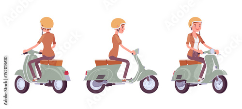 Young woman riding a scooter