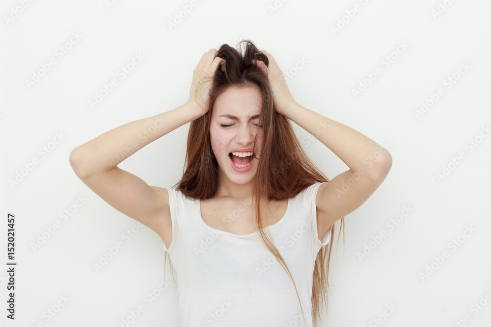 A young emotional woman, isolated on white background