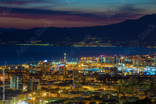 GENOA (GENOVA), ITALY, MARCH 10, 2017 - Aerial view of the city of Genoa (Genova) at dusk.