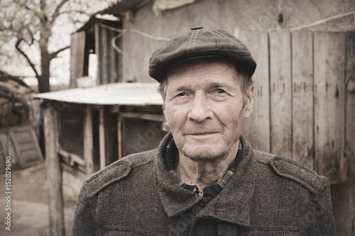 Senior man in a hat in the ukrainian village