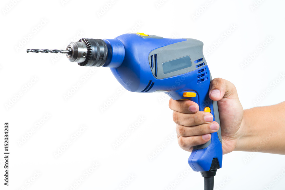 Hand with cordless screwdriver or drill isolated on a white background. With clipping path Hand with cordless screwdriver or drill isolated on a white background. With clipping path