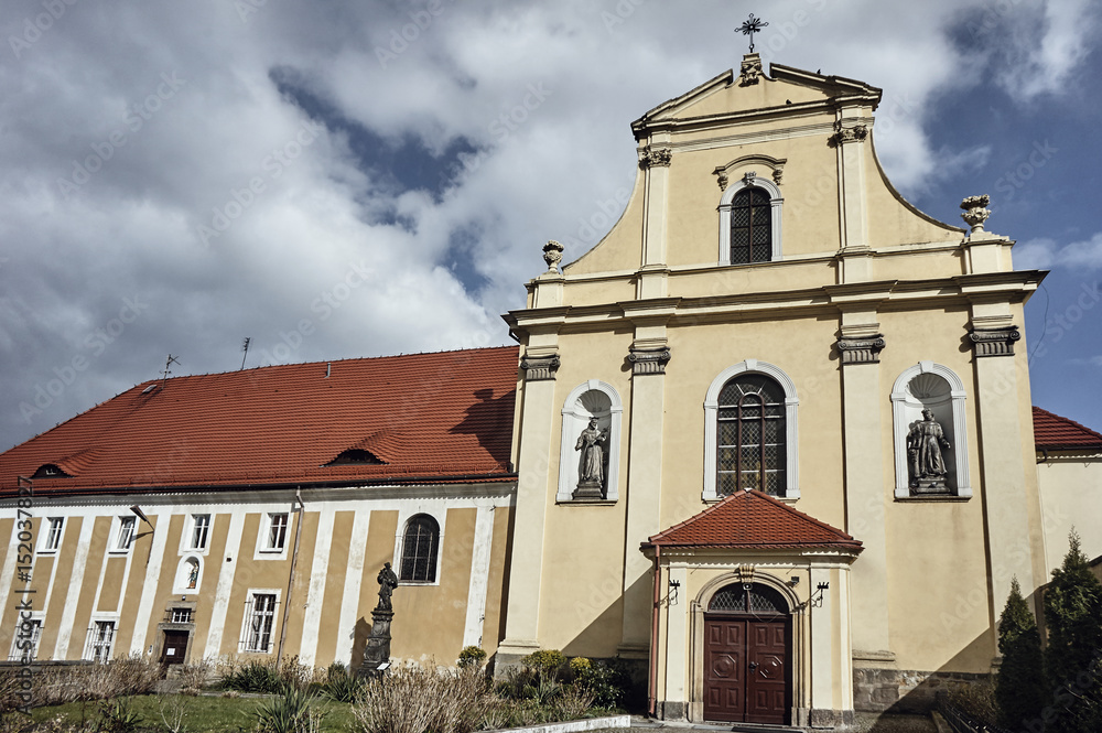 Facade of baroque monastic church in Poland.