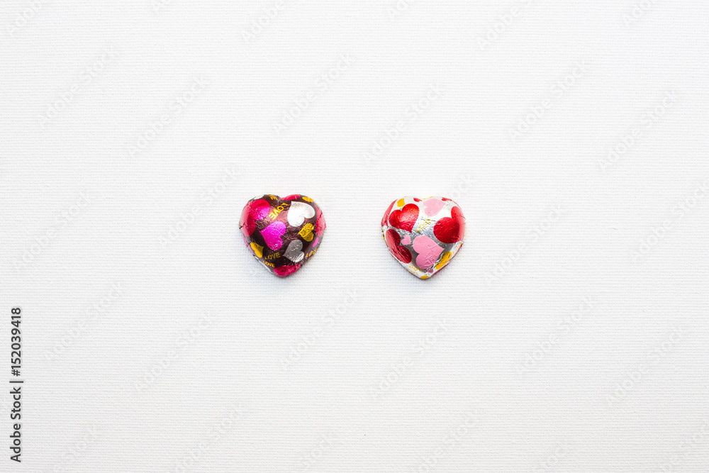 Chocolate heart-shaped on white canvas background Chocolate heart-shaped on white canvas background