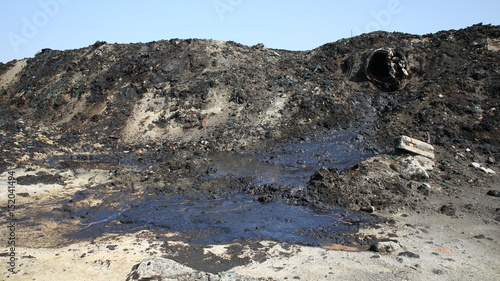 Former dump toxic waste, oil lagoon contamination. Nature effects from water and soil contaminated with oil and chemicals, environmental disaster, contamination of the environment, Moravia, Europe