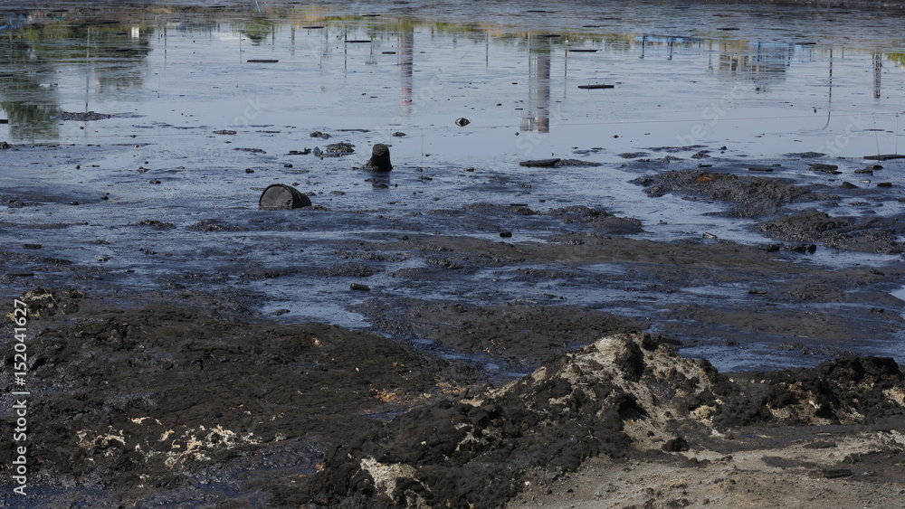 Former dump toxic waste, oil lagoon contamination. Nature effects from water and soil contaminated with oil and chemicals, environmental disaster, contamination of the environment, Moravia, Europe