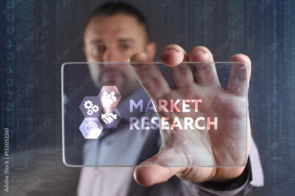 Fototapeta premium Business, Technology, Internet and network concept. Young businessman working on a virtual screen of the future and sees the inscription: Market research