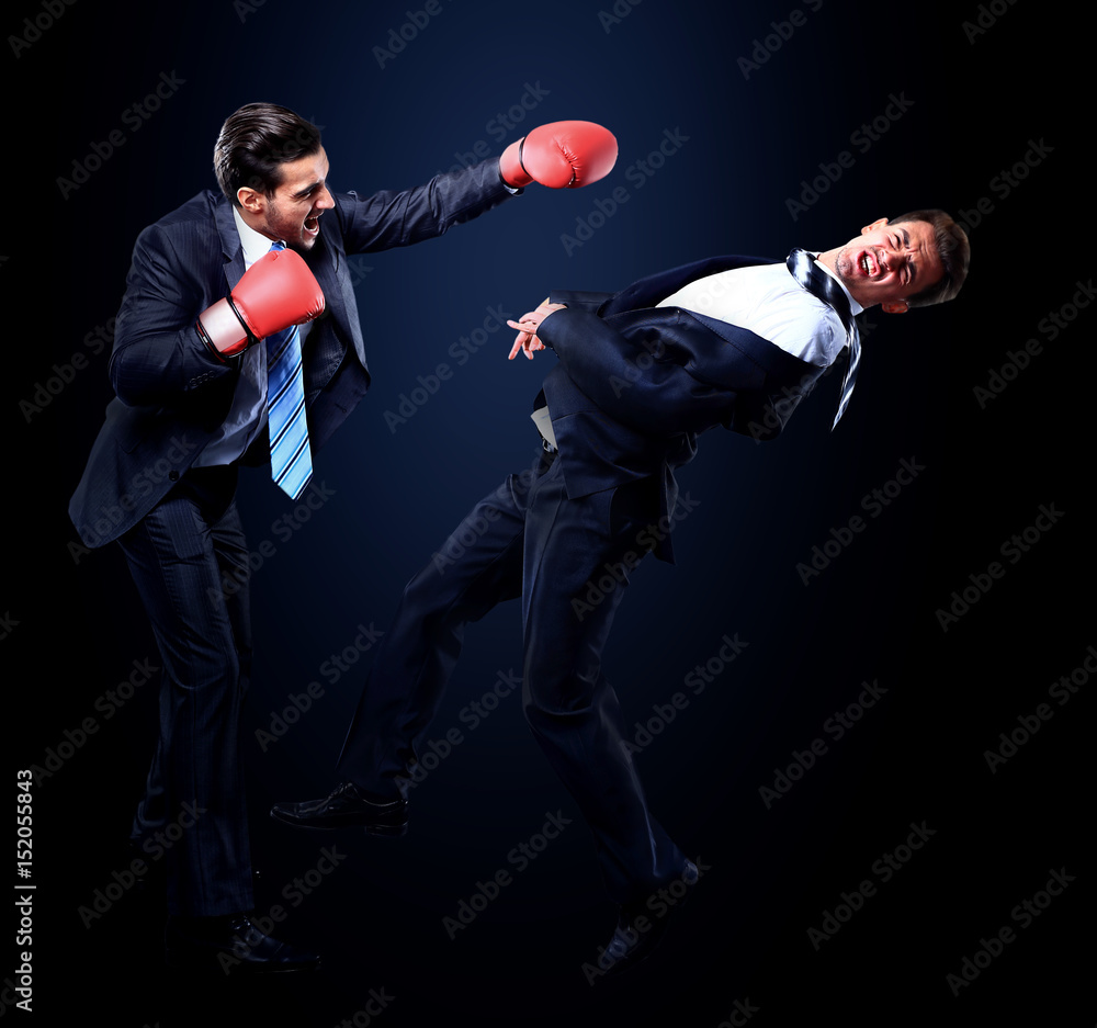 business concept. competition in the business of two young businessmen business concept. competition in the business of two young businessmen