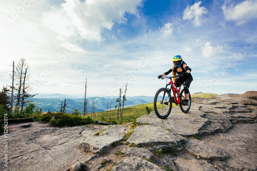Woman riding MTB mountain bike