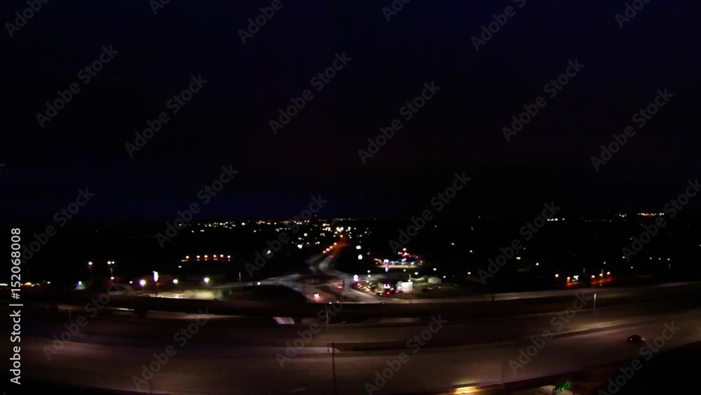 vertical top down aerial view of traffic on freeway interchange at night vertical top down aerial view of traffic on freeway interchange at night