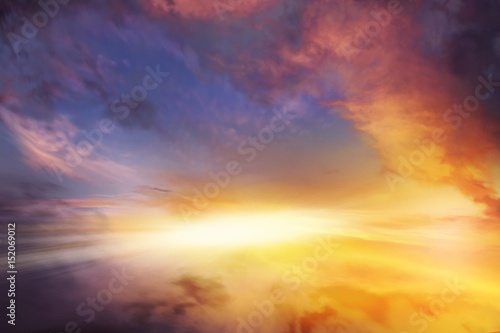 Sunset sky . Sunset or sunrise with clouds, light rays and other atmospheric effect . background sky at sunset and dawn