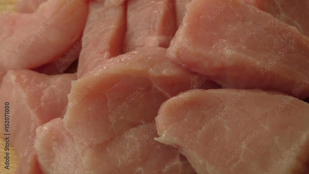 Tasty raw pork meat on wooden cutting board
Tasty raw pork meat on wooden cutting board
