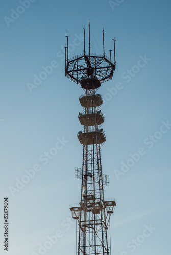 TV tower with antennas,telecommunication building, photo