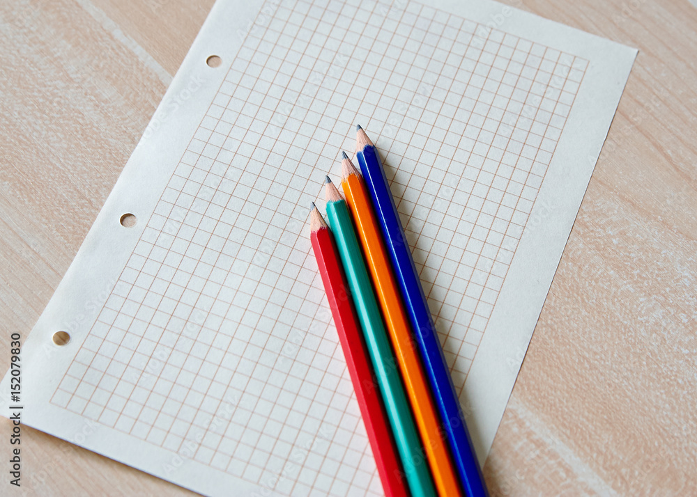 Blank paper and pencil on wooden table Blank paper and pencil on wooden table