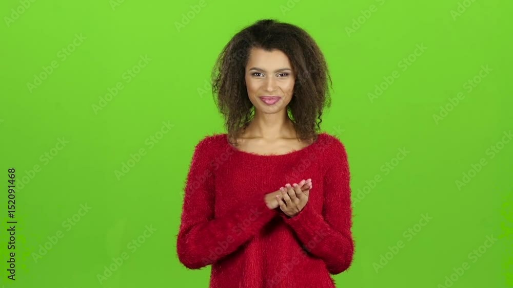 Afro american woman smiles and clapping, green screen. Slow motion Afro american woman smiles and clapping, green screen. Slow motion