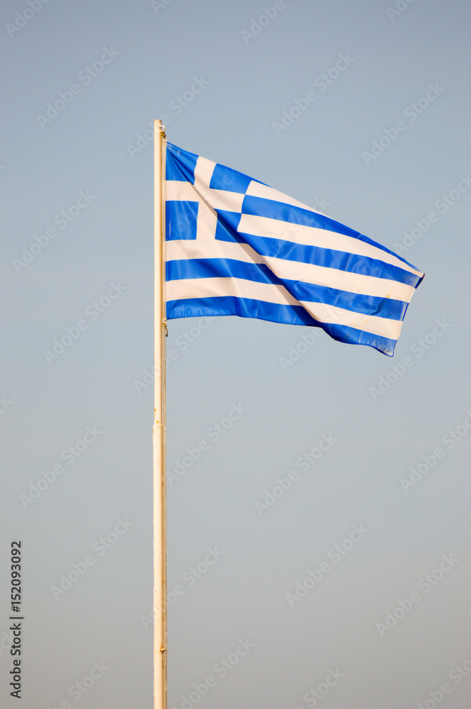 Fototapeta premium Greek flag floating on a white mat