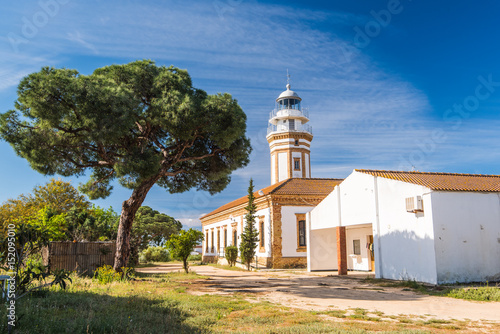 Faro lighthouse in Mazagon near Palos de la Frontera,Huelva,Spain photo