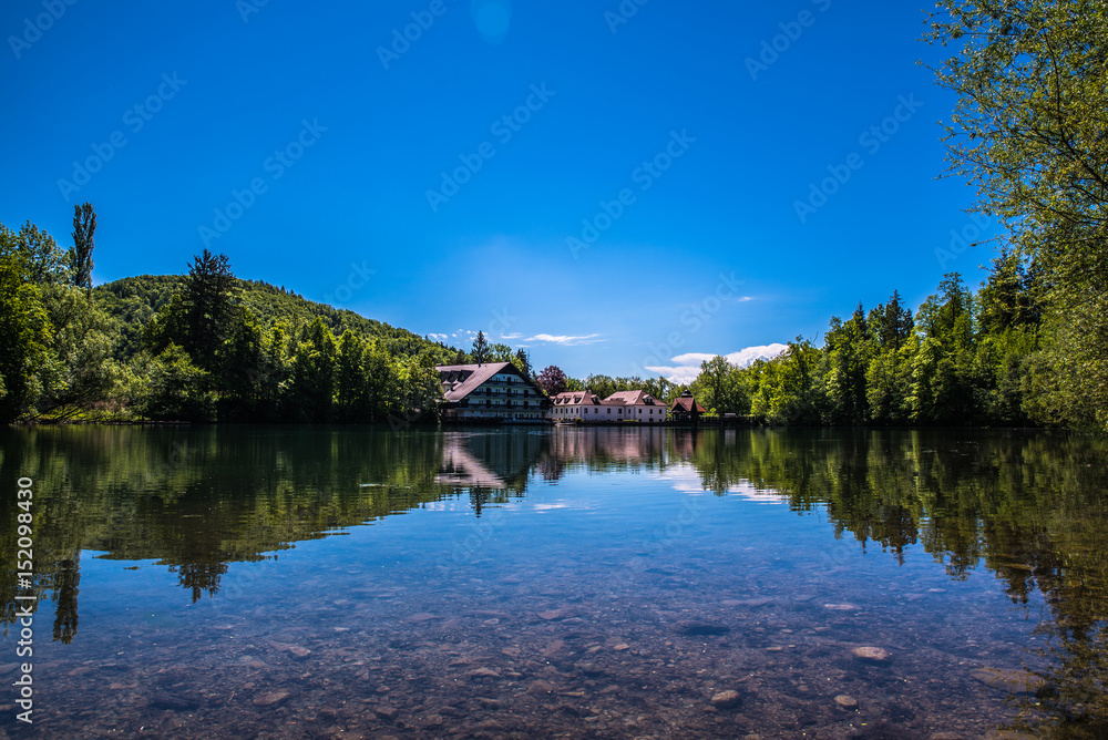 Fototapeta premium Beautiful lake with a hotel in the background