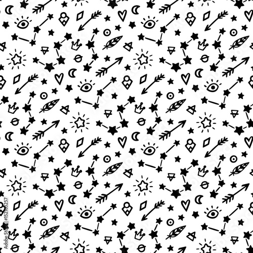 Seamless pattern, in memphis style, with magic simbols, on a white background. It can be used for packaging, wrapping paper, textile and etc. © viairevi