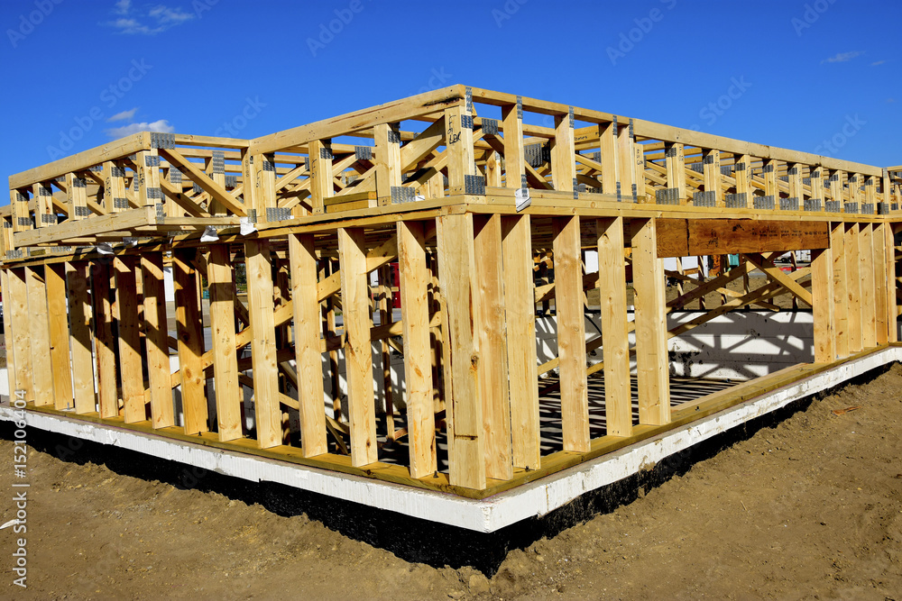 Obraz premium New wood frame home under construction.