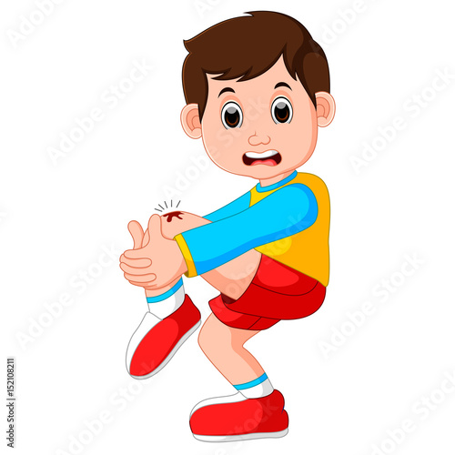 boy crying with a scratch on his knee
