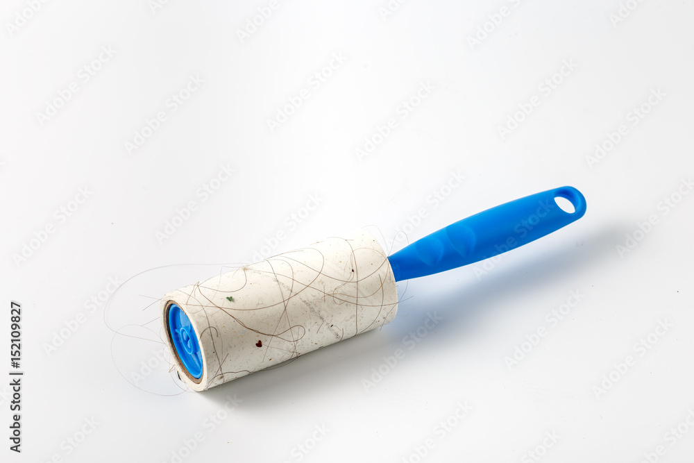 Sticky Lint Roller on white background Sticky Lint Roller on white background
