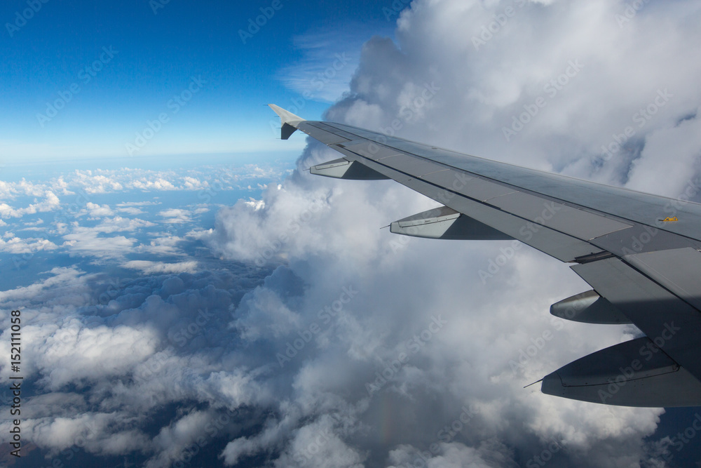 Above the clouds.Wing aircraft on the sky Above the clouds.Wing aircraft on the sky