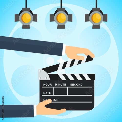 hands with clapperboard poster