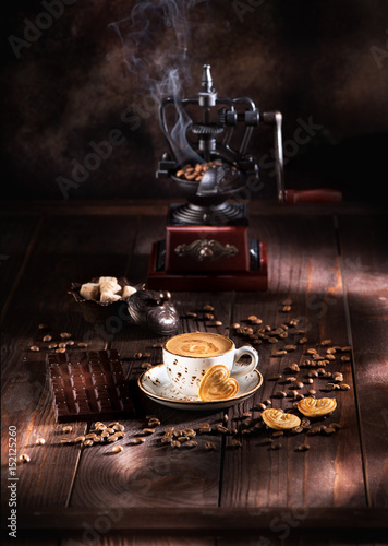 Coffee with chocolate. Still life with coffee grinder