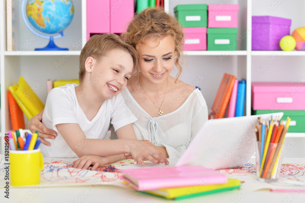 Mom and son doing lessons Mom and son doing lessons