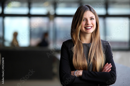 Happy smiling young businesswoman