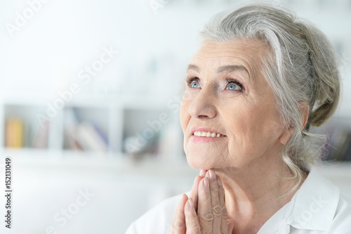 Beautiful gray-haired elderly woman