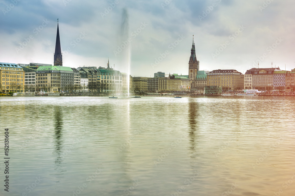 Lake with a fountain and a ships, center of Hamburg, Germany Lake with a fountain and a ships, center of Hamburg, Germany