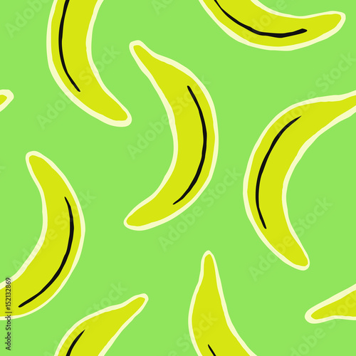 Hand drawn seamless pattern with bananas in yellow, black and cream on green background.