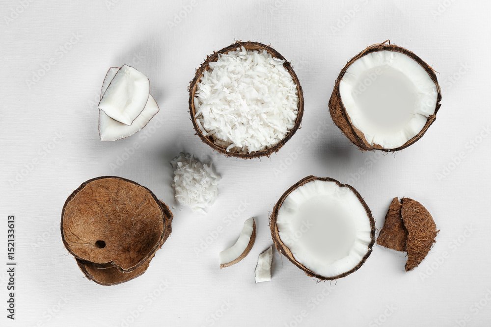 Beautiful composition with coconuts on white background Beautiful composition with coconuts on white background