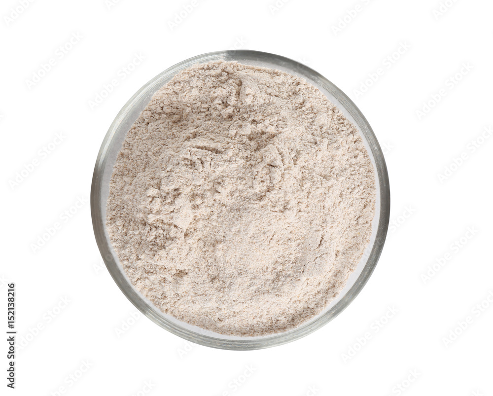 Glass bowl with flour on white background Glass bowl with flour on white background