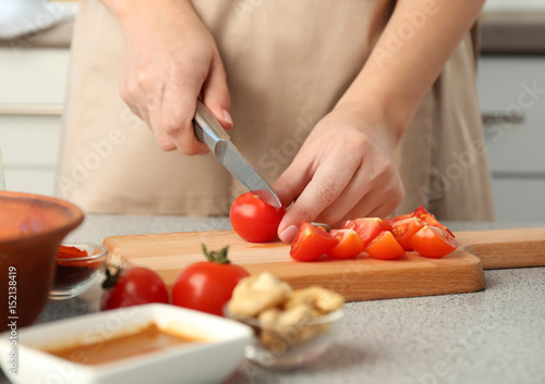Woman cooking in kitchen
