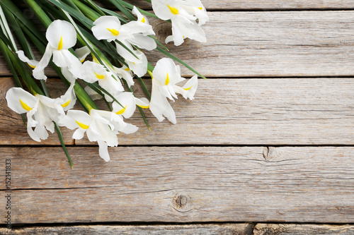 Fototapeta Naklejka Na Ścianę i Meble -  Bouquet of iris flowers on grey wooden table
