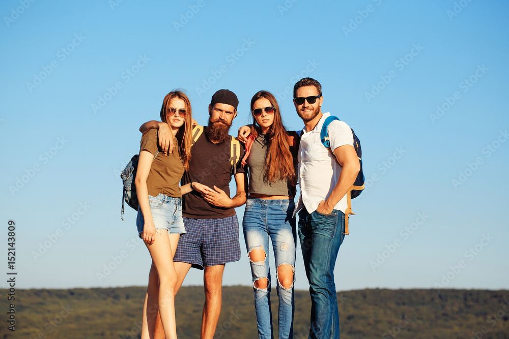 Happy, smiling, pretty girls and handsome men standing blue sky Happy, smiling, pretty girls and handsome men standing blue sky