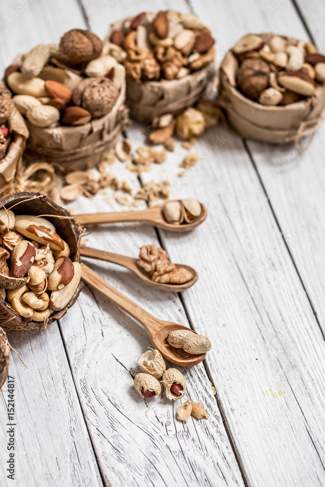 different nuts in plates different nuts in plates