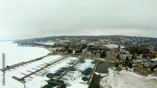 Petoskey Harbor Breakwater in spring with frozen lake photo