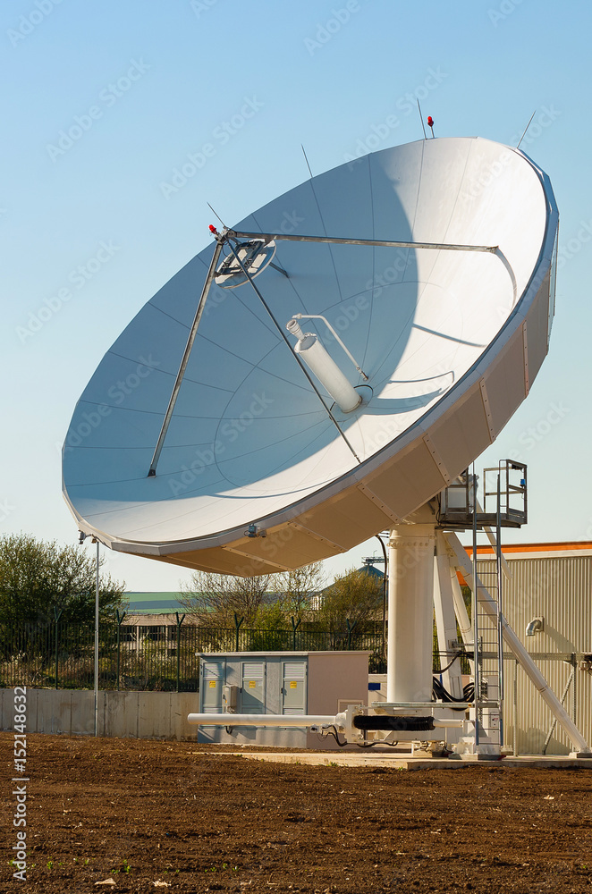 A large satellite dish for telecommunications industry aimed into space