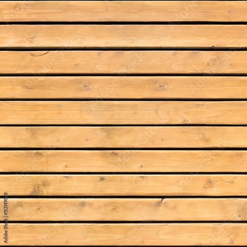 Seamless pattern of brown wooden horizontal planks. Horizontal and vertical seamless light wood texture background