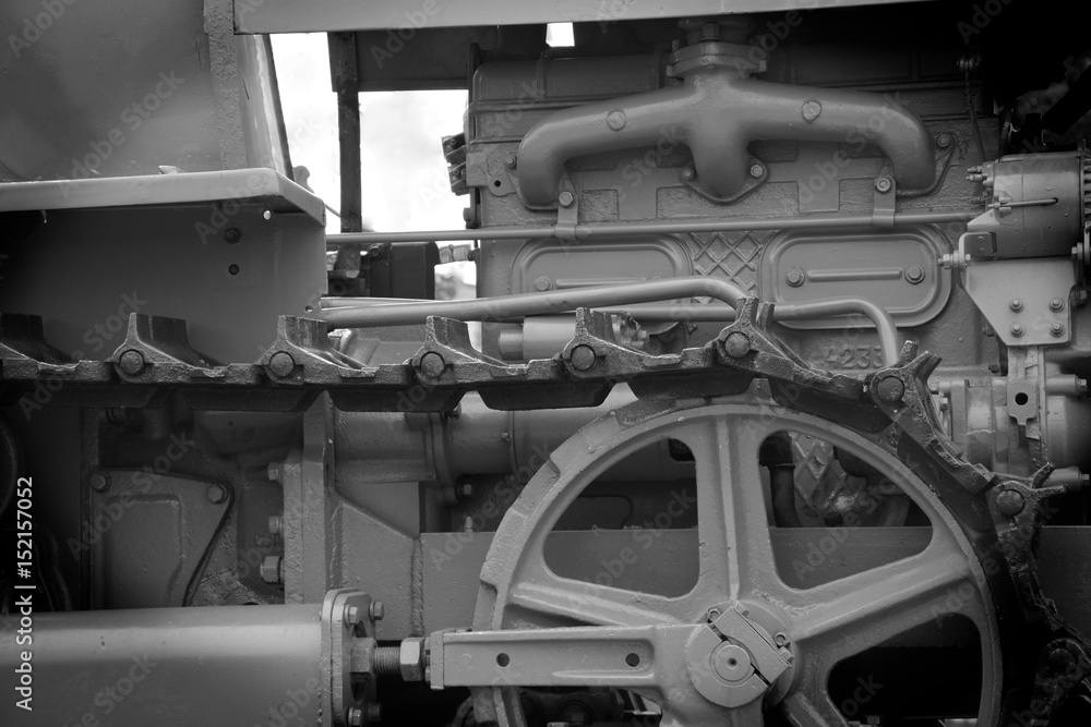 Obraz premium Tractor caterpillar part close up