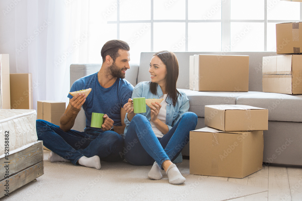Young couple moving to a new apartment together relocation Young couple moving to a new apartment together relocation