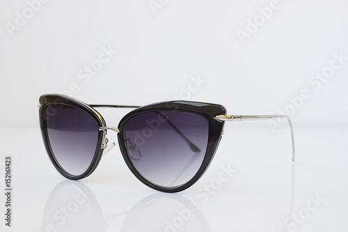 Fashionable sunglasses cat's eye shape on the white background