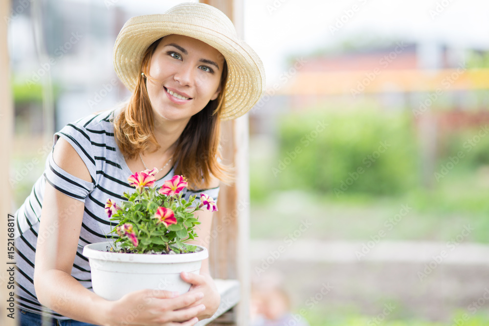 Young woman in garden
