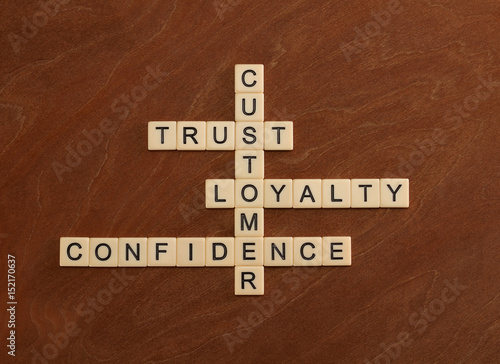 Crossword puzzle with words Trust, Loyalty, Confidence. Customer loyalty concept.