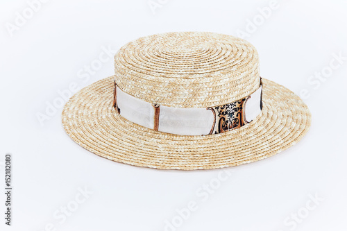 Isolated straw hat with silk tape summer collection women accessory on studio white background detail sale.