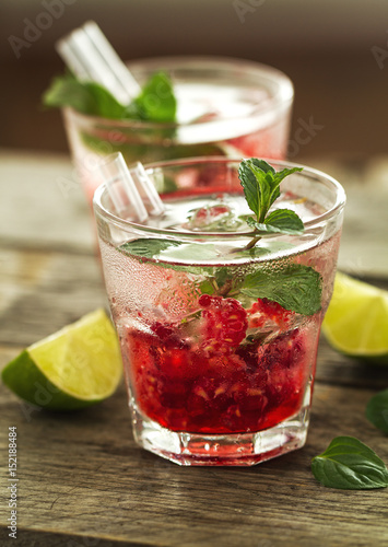Wallpaper Mural Tasty cold fresh drink lemonade with raspberry, mint, ice and lime in glass. Closeup. Torontodigital.ca